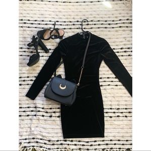 Black body on velvet dress